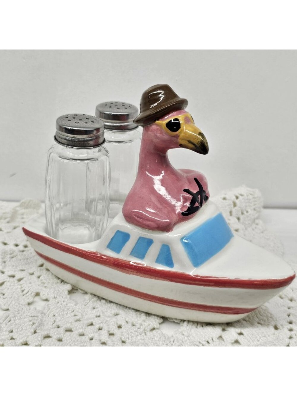 CRACKER BARREL FLAMINGO AND BOAT HOLDER WITH SALT AND PEPPER SHAKER SET